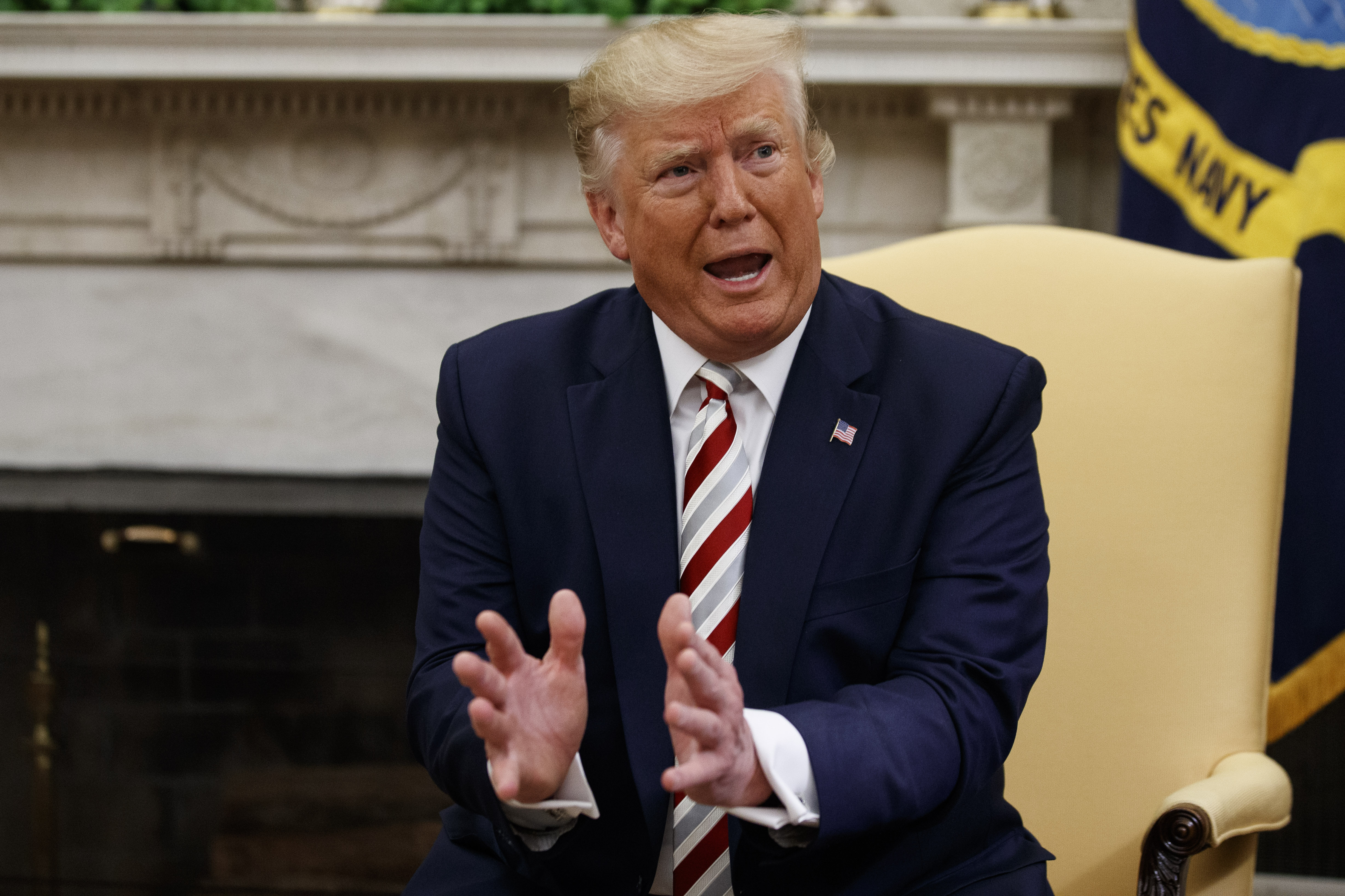 President Donald Trump speaks during a meeting with Romanian President Klaus Iohannis in the Oval Office of the White House in Washington. AP Photo by Alex Brandon