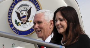In this January 2020 file photo, Vice President Mike Pence and his wife Karen disembark from Air Force Two upon their arrival at Rome's Ciampino airport. Karen Pence says it’s OK to not be OK during the coronavirus pandemic. While Vice President Mike Pence runs the White House coronavirus task force, his wife is leading a parallel effort to help people deal with anxiety and other unsettling emotions brought on by the pandemic. AP Photo by Alessandra Tarantino